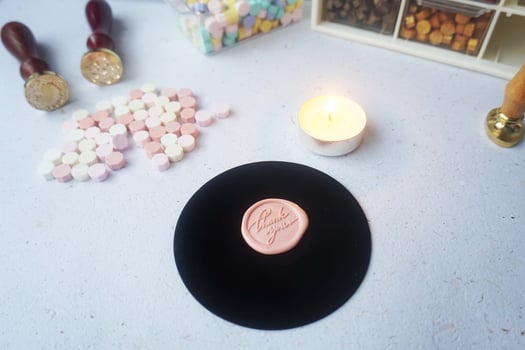pretty wax coins for a vintage look for wedding or invitation decoration photo