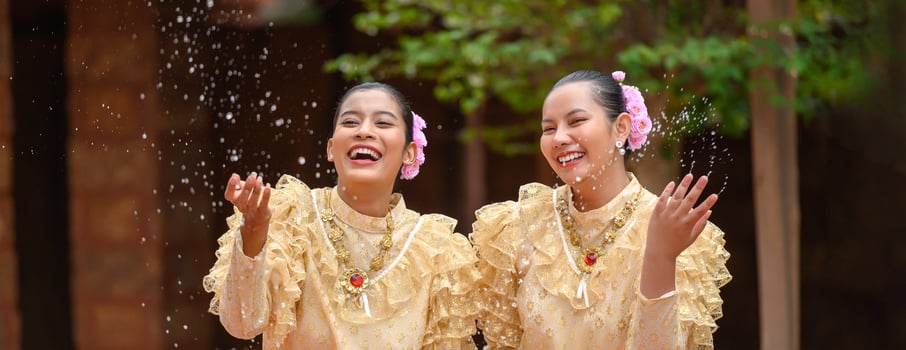 Portrait beautiful women in Songkran festival with Thai Traditional costume photo