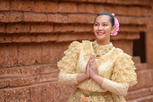 Portrait beautiful woman in Songkran festival with Thai Traditional costume photo
