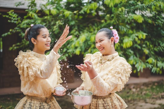 Portrait beautiful women in Songkran festival with Thai Traditional costume photo