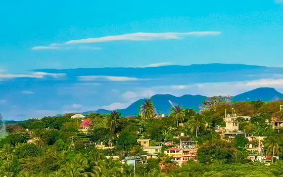 Mountain panorama cliffs rocks hilly tropical landscape Puerto Escondido Mexico. photo