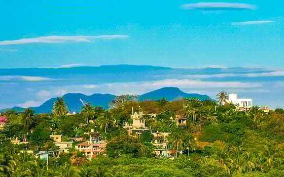 Mountain panorama cliffs rocks hilly tropical landscape Puerto Escondido Mexico. photo