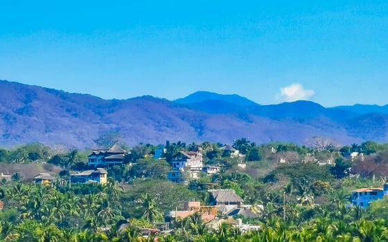 Mountain panorama cliffs rocks hilly tropical landscape Puerto Escondido Mexico. photo