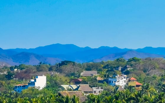 Mountain panorama cliffs rocks hilly tropical landscape Puerto Escondido Mexico. photo