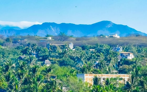 Mountain panorama cliffs rocks hilly tropical landscape Puerto Escondido Mexico. photo