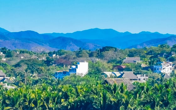 Mountain panorama cliffs rocks hilly tropical landscape Puerto Escondido Mexico. photo