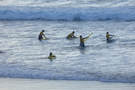 Surf school on an ocean beach photo