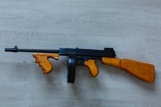 thompson sub-machine gun look alike on white photo