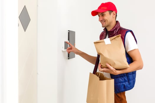 Man food delivery in an apartment photo