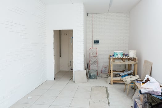 Unfinished apartment interior, repair in a white office room photo