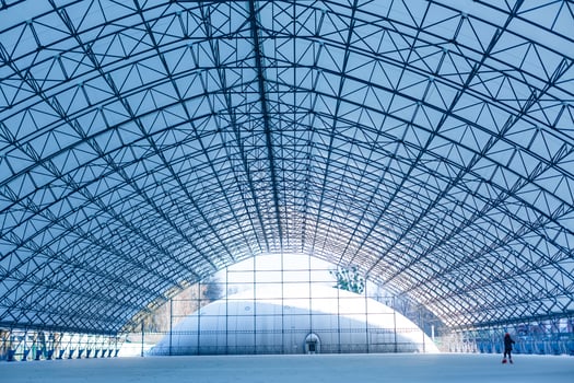modern empty warehouse, large glass roof hangar photo