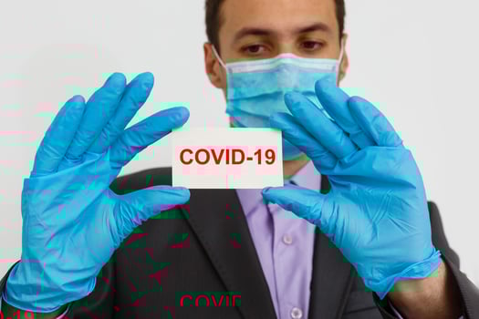 Use protect filters against coronavirus Businessman in hygienic mask and gloves, 2019-nCoV, flu epidemic. isolated photo