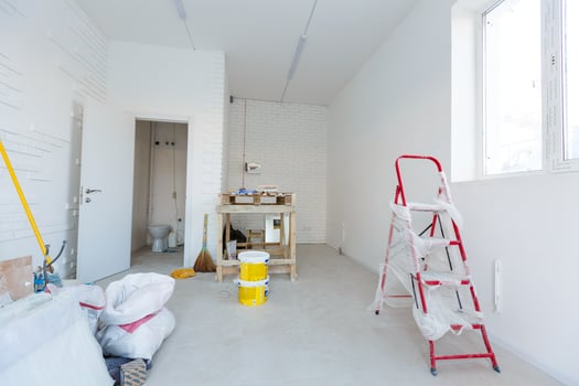 Small apartment without repair in a new building. A room in an unfinished house. Walls of foam block and concrete floor in a tiny apartment. photo