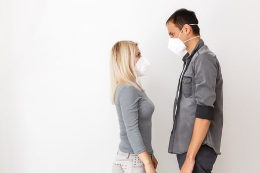 Man and woman in a medical mask. Family portrait during a pandemic. Protective medical face mask. Covid 19 Pandemic Virus Protection. photo