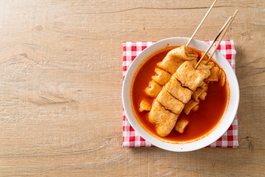 Odeng - Korean fish cake skewer in Korean spicy soup photo