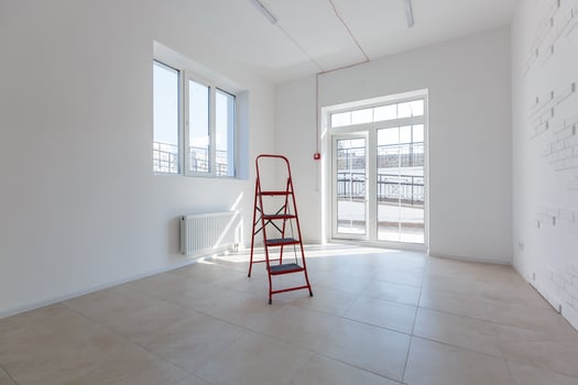 Office extension that uses bricks as a wall, construction, improvement. Interior of small room with window and bricks walls renovation, extension, overhaul and reconstruction. photo