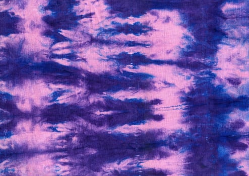 Tie Dye. Fabric Hippie Design. Batik.Textile shiboriTie Dye. Fabric Hippie Design. Indigo Print. Cotton fabric abstract texture psychedelic background. photo