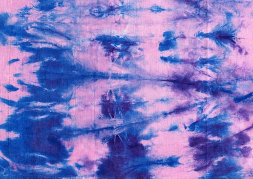 Tie Dye. Fabric Hippie Design. Batik.Textile shiboriTie Dye. Fabric Hippie Design. Indigo Print. Cotton fabric abstract texture psychedelic background. photo