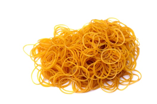 Brown rubber bands isolated on white background. Concept, equipment for fasten, tie general things, bind small objects together,made from natural para rubber. Sticky, flexibility,  used for versatile. photo