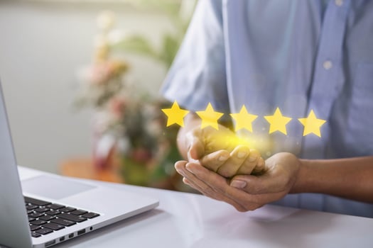 Man hand with popup five star icon for feedback review satisfaction service, Customer services best excellent business rating experience online. best quality product and service. photo