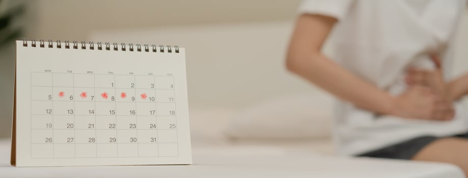 Menstruation, period cycle day of monthly, hurt asian young woman, female hand in stomachache, suffer from PMS premenstrual, belly or abdomen pain on bed at home. Health problem Inflammation in body photo