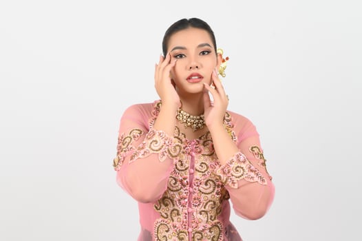 Young beautiful woman dress up local culture southern region showing beauty face posture photo