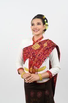 Portrait of Beautiful Thai Woman in Traditional Clothing Posing pay respect photo
