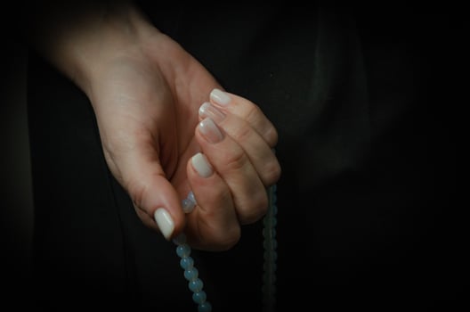 on a dark background light nails after manicure photo