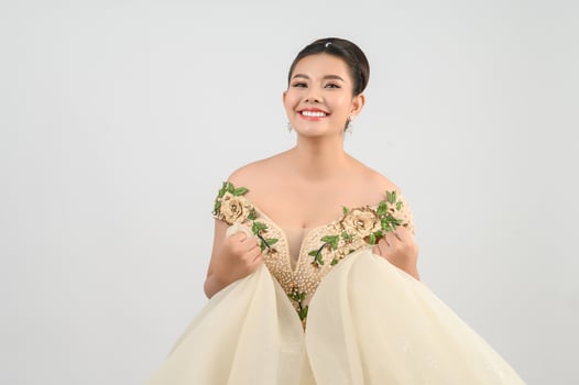 Young asian beautiful bride smiling with happy on white background photo