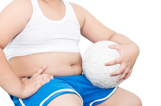 fat boy hold football isolated photo
