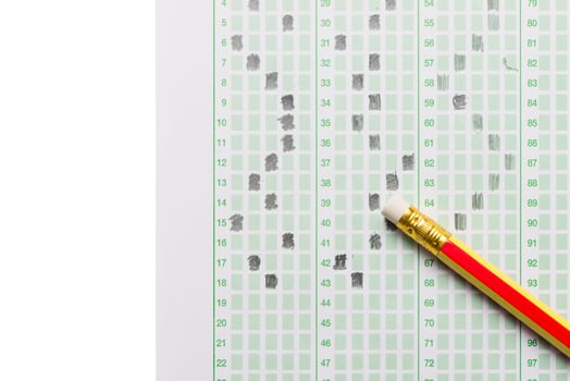 pencil on examination test sheet isolated photo