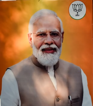New Delhi, India - January 16 2023 - Prime Minister Narendra Modi cut out during BJP road show, the statue of PM Modi while attending a big election rally in the capital photo