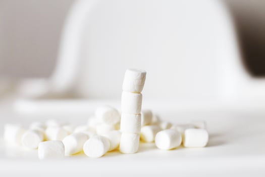 marshmallow pyramid. marshmallows on a white background photo
