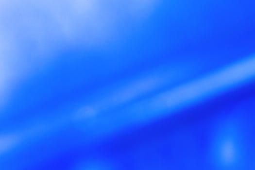 abstract light blue blurred shine background with gradient photo