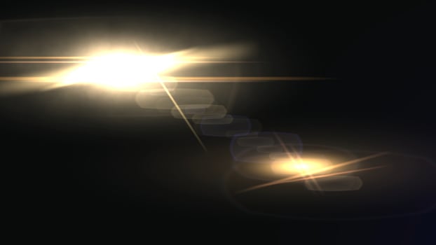 Lens flare sun in dark background photo