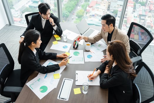 image of a group of Asian businessmen working together at the company photo