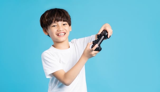 Asian boy portrait on blue background photo
