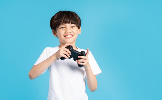 Asian boy portrait on blue background photo