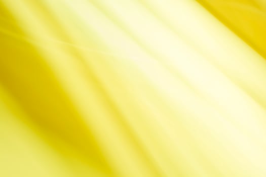 abstract yellow background with some smooth lines in it and some rays in it photo