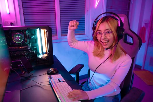 Asian woman gamer play computer video game concept. photo