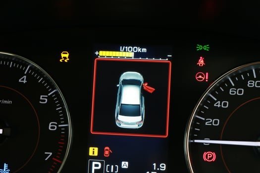 Car door opening warning light in the dashboard photo
