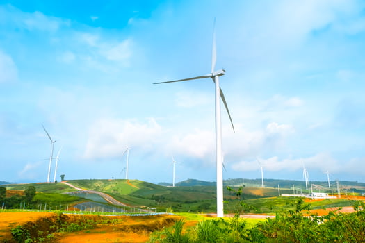 Wind turbines on the mountain of nature on blue sky at Khao Kho, Phetchabun, Thailand photo