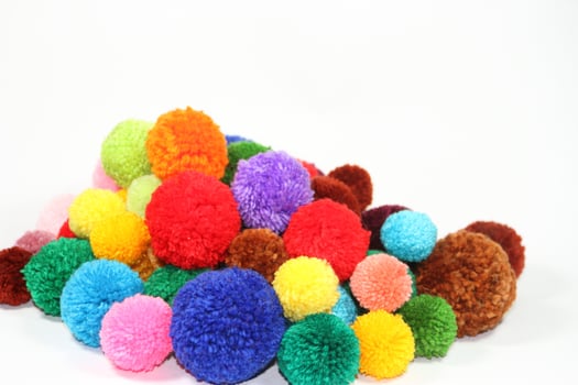 COLORED WOOL POMPONES FABRIC FASHION ACCESSORIES photo