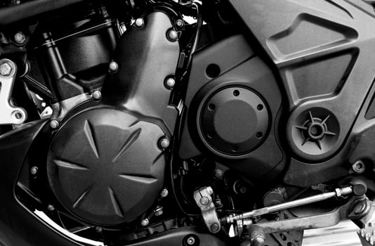 Close up black motorcycle engine photo
