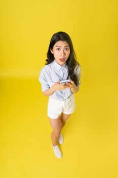 image of asian woman on a yellow background photo