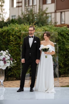wedding ceremony of the newlyweds on the glade photo