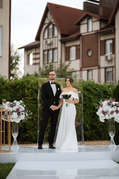 wedding ceremony of the newlyweds on the glade photo
