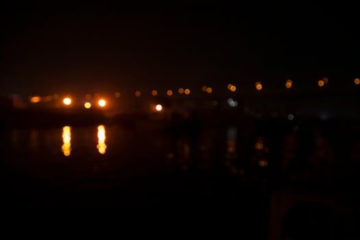 Colorful Defocus Abstract bokeh light effects on the night black background texture photo