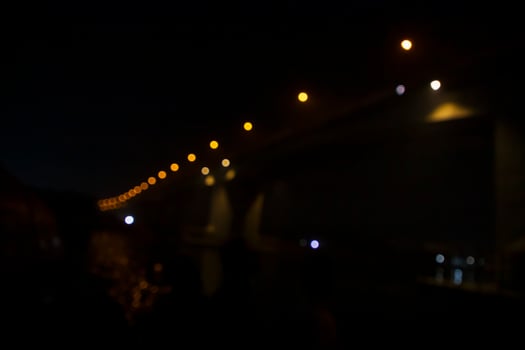 Colorful Defocus Abstract bokeh light effects on the night black background texture photo