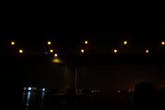 Colorful Defocus Abstract bokeh light effects on the night black background texture photo